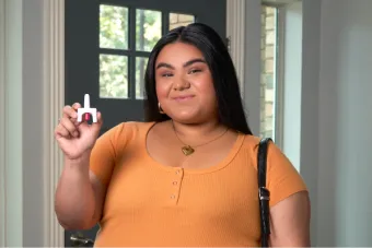 TTOR women holding naloxone