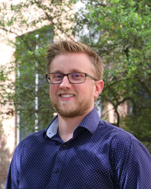 Headshot of Zach Cohen-Ford