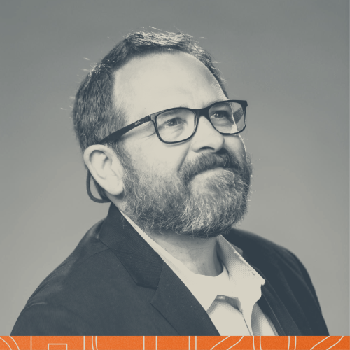 Professional headshot of speaker