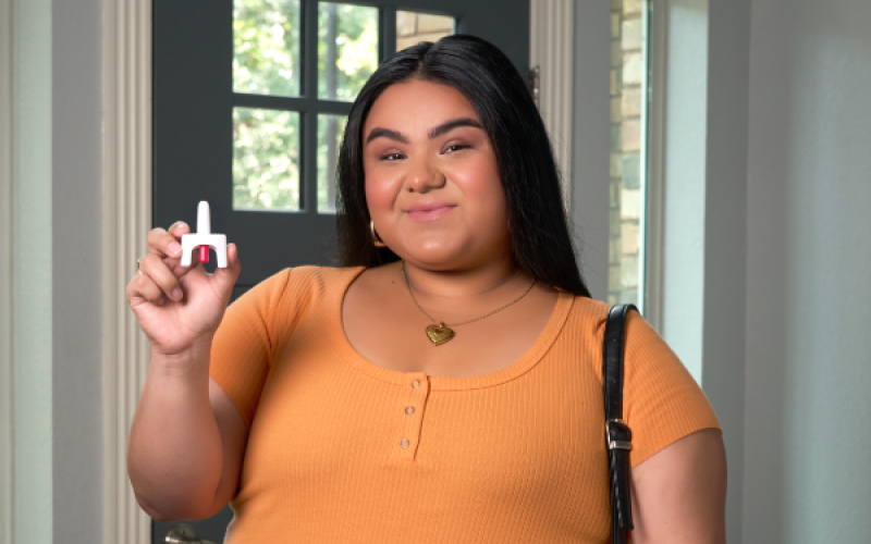 TTOR women holding naloxone
